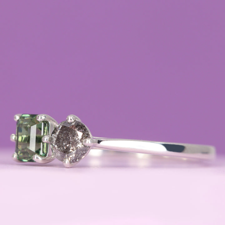 Juno - Emerald Cut Teal Sapphire and Round Salt and Pepper Diamond Toi et Moi Engagement Ring