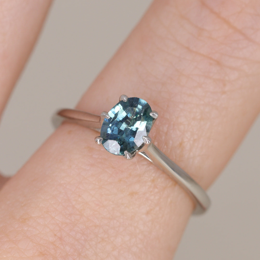 Raine - Oval Cut Teal Sapphire Lotus Flower Solitaire Engagement Ring