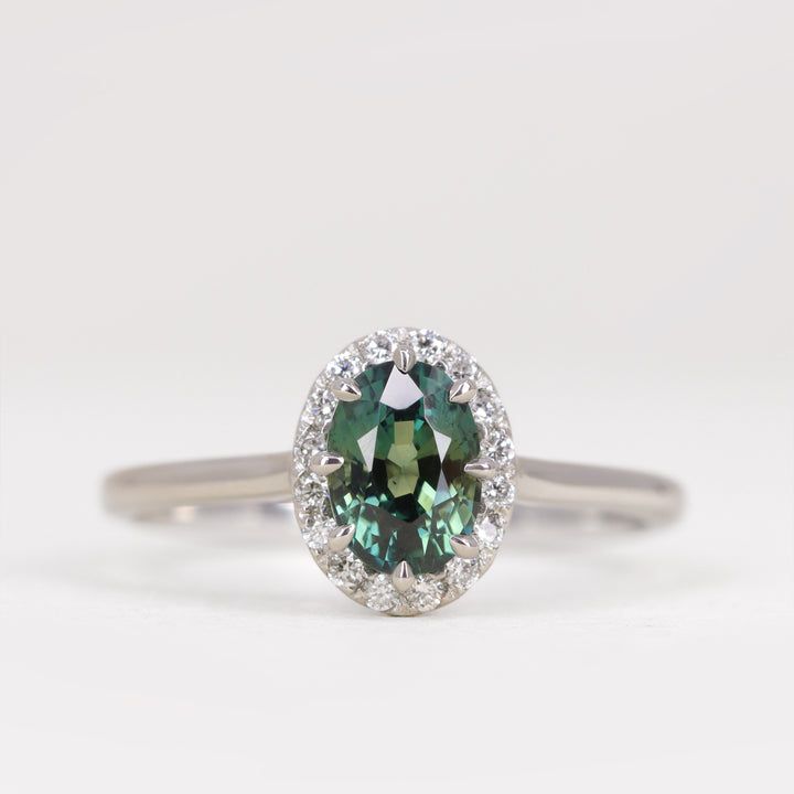 Charlotte - Oval Cut Teal Sapphire Hugging Halo Engagement Ring - Ready-to-Wear