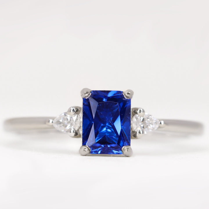 Elspeth - Radiant Cut Blue Sapphire and Diamond Trilogy Engagement Ring