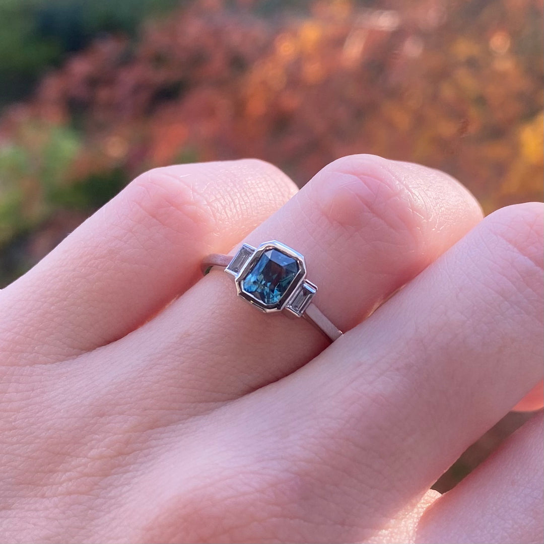 Phoebe - Radiant Cut Blue Teal Sapphire and Lab Grown Baguette Diamond Bezel Set Modern Art Deco Engagement Ring in Platinum - Custom Made-to-Order Design