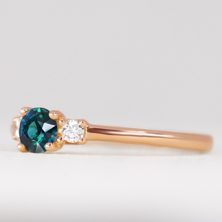 Millie - Round Brilliant Cut Teal Sapphire and Diamond Trilogy Engagement Ring
