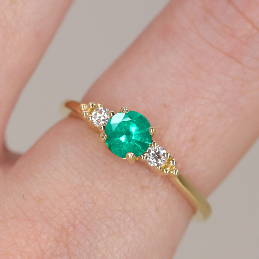 Natalia - Round Cut Emerald and Diamond Trilogy Engagement Ring