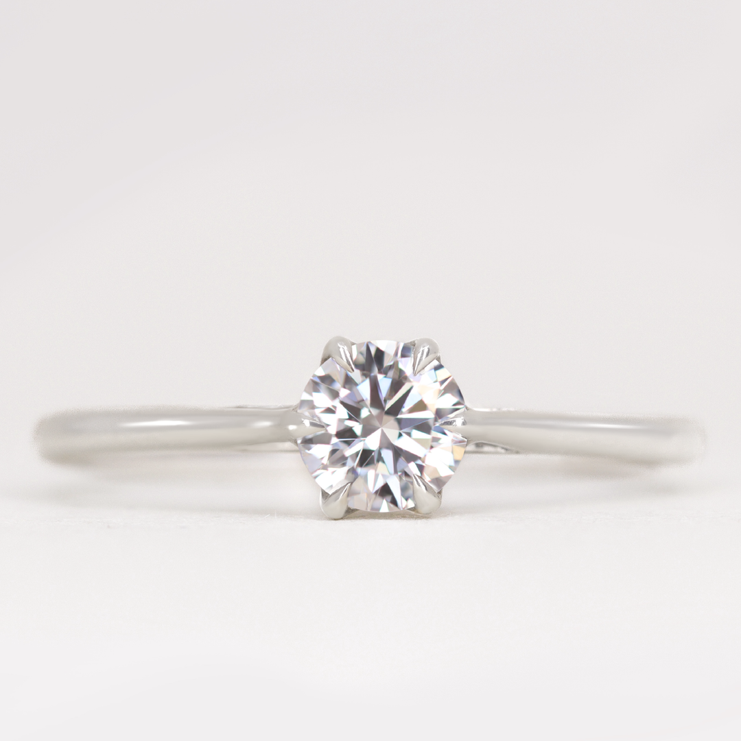 Raine - Solitaire Engagement Ring with Lotus Basket Detail Setting