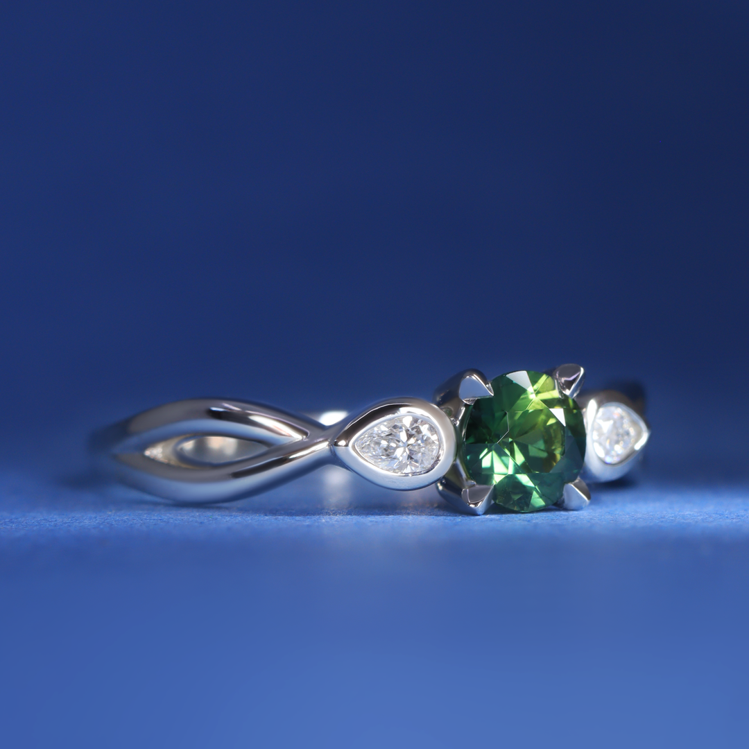 Evangeline - Round Brilliant Cut Teal Sapphire Trilogy Engagement Ring - Ready-to-Wear Engagement Rings - Ready-to-Ship