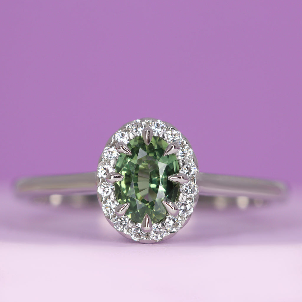 Charlotte - Oval Cut Green Teal Sapphire Hugging Halo Engagement Ring