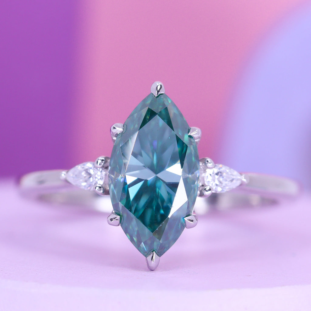 Elspeth - Marquise Cut Teal Moissanite and Diamond Trilogy Engagement Ring