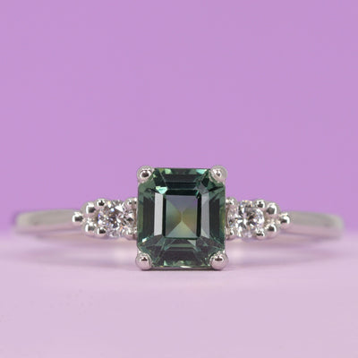Natalia - Emerald Cut Blue Teal Sapphire and Lab Grown Diamond Delicate Trilogy Ring in Platinum - Ready-to-Wear