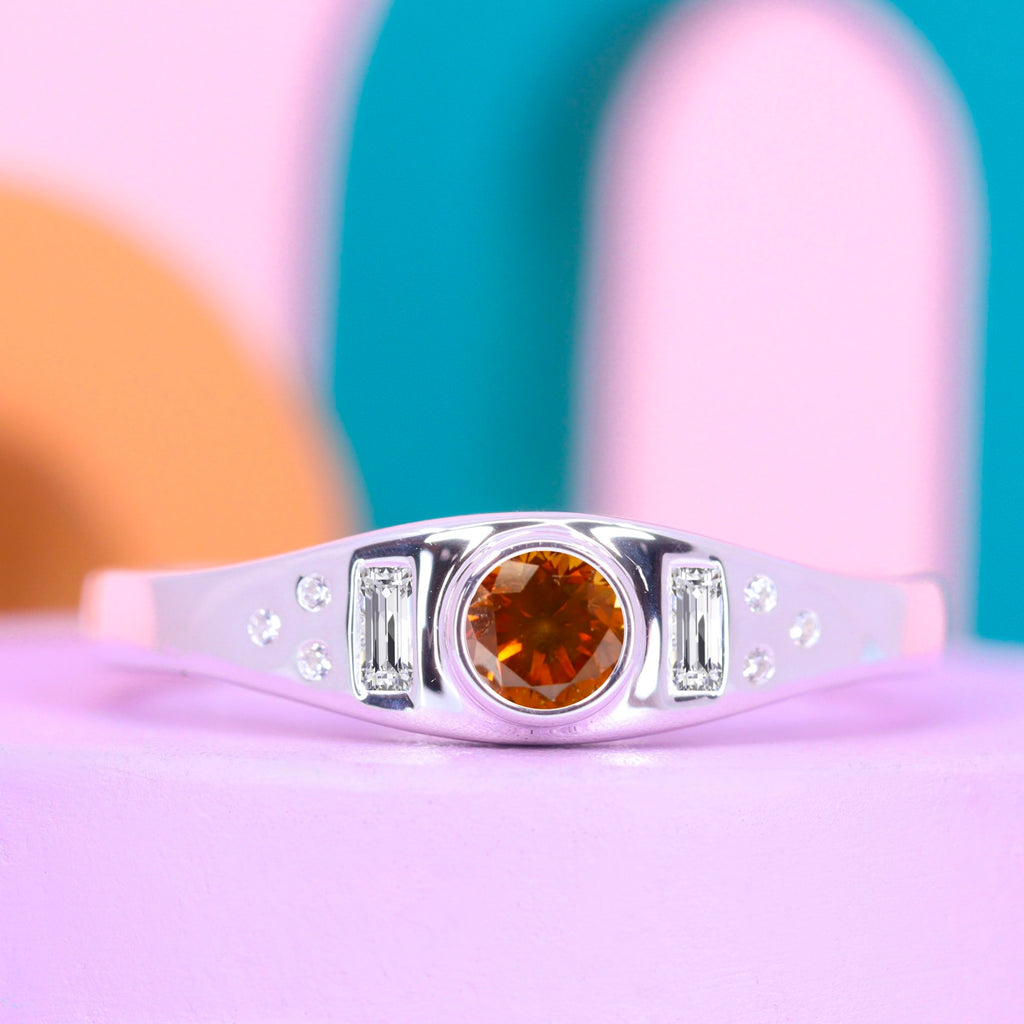 Max - The Euphoria Collection - Round Brilliant Cut Orange Diamond Ring with Baguette and Round Diamond Side Stones - Ready In 6 Weeks