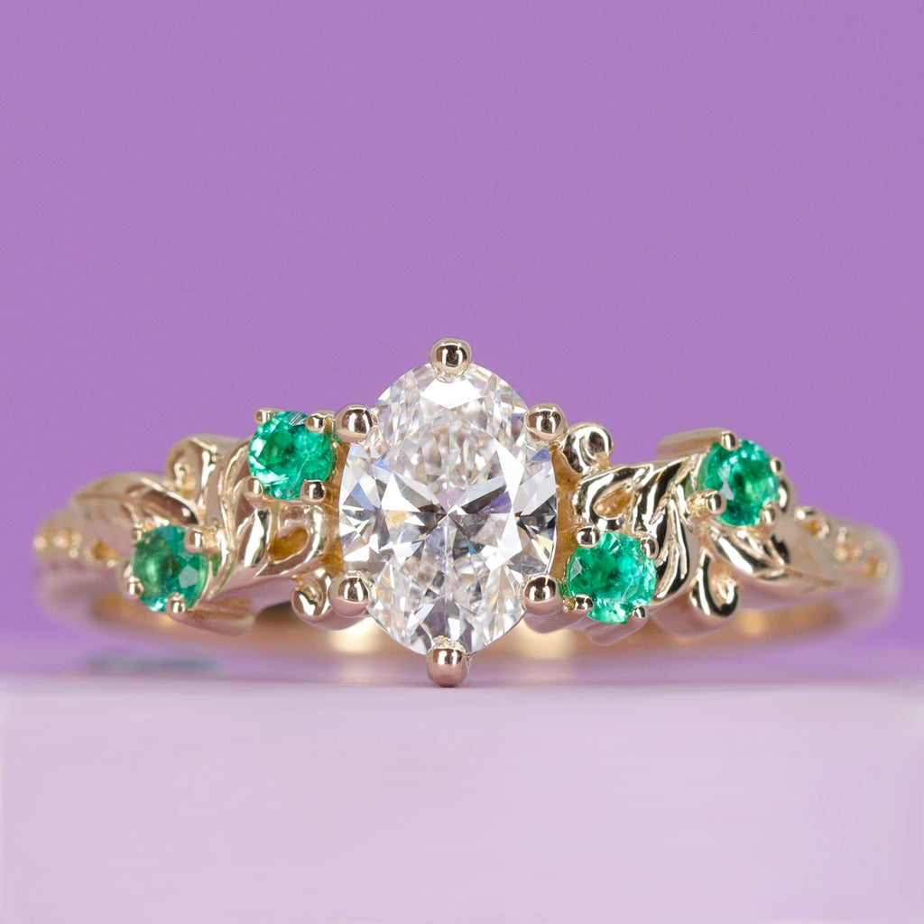 Laurel - The Botanicals Collection - Oval Lab Grown Diamond and Emerald Decorative Leaf/Vine Filigree Art Nouveau Engagement Ring in 14ct Yellow Gold - Ready-To-Wear