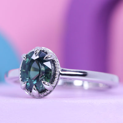 Georgia - Dopamine by Jessica Flinn - Oval Cut Teal Sapphire Solitaire Engagement Ring with Beading in Platinum - Ready-to-Wear