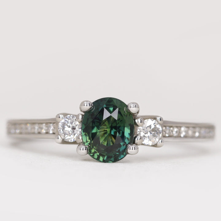 Callie - Oval Cut Teal Sapphire Trilogy Engagement Ring