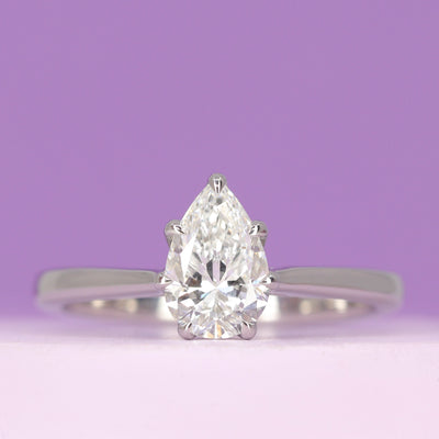 Raine - Pear Cut Lab Grown Diamond Solitaire Ring with Lotus Flower Inspired Setting in Platinum - Ready-to-Wear