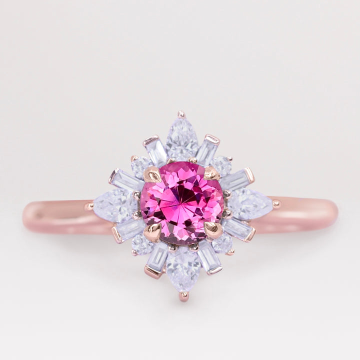 Pink sapphire and white diamond engagement ring in rose gold