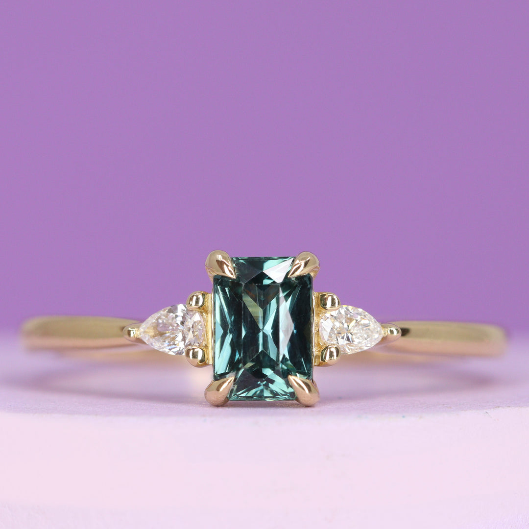 Elspeth - Radiant Cut Teal Sapphire and Diamond Trilogy Engagement Ring