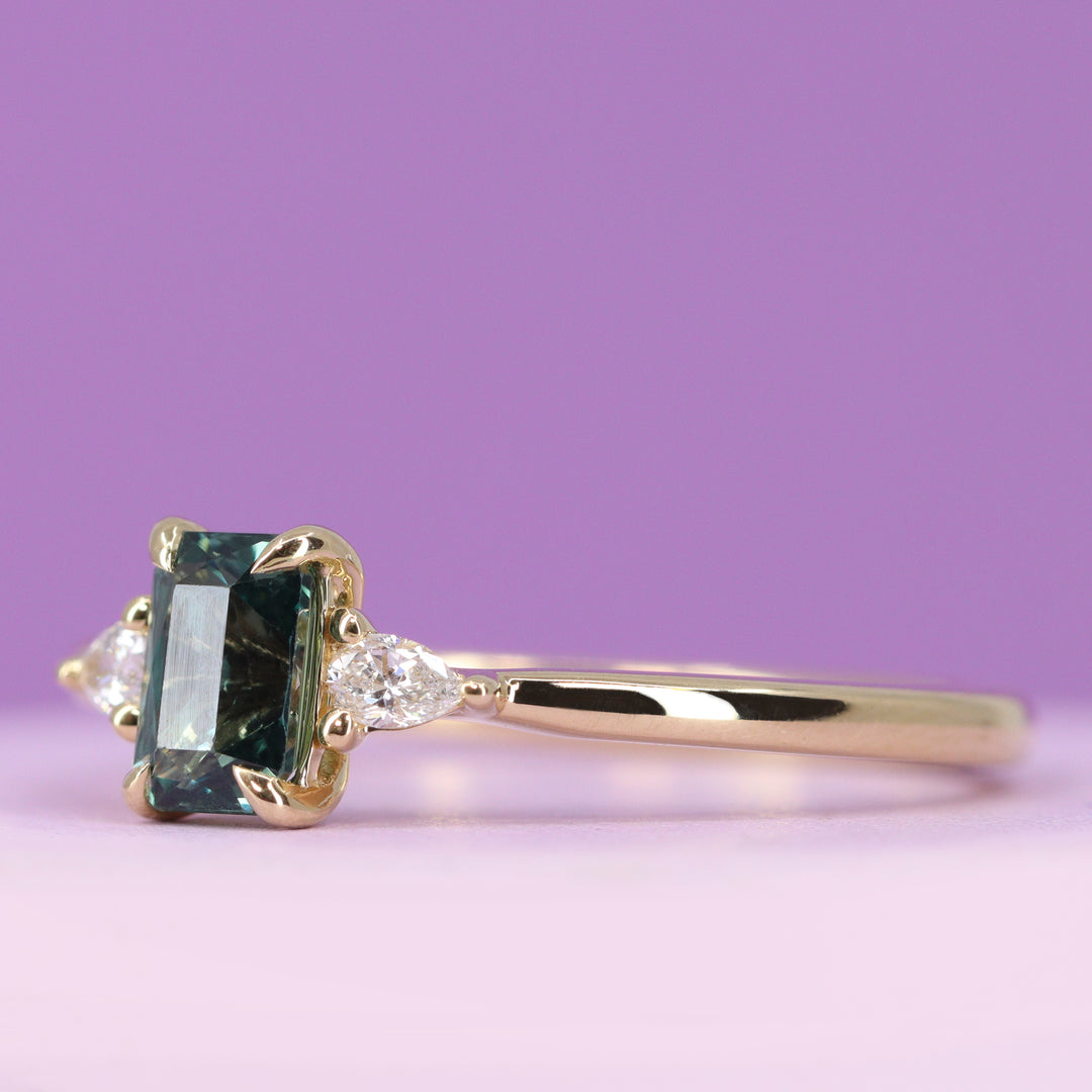 Elspeth - Radiant Cut Teal Sapphire and Diamond Trilogy Engagement Ring