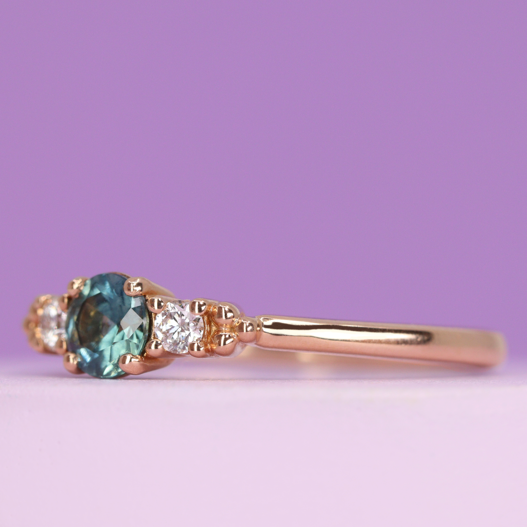 Natalia - Round Brilliant Cut Montana Sapphire and Lab Grown Diamond Trilogy Engagement Ring in Rose Gold - Ready-to-Wear