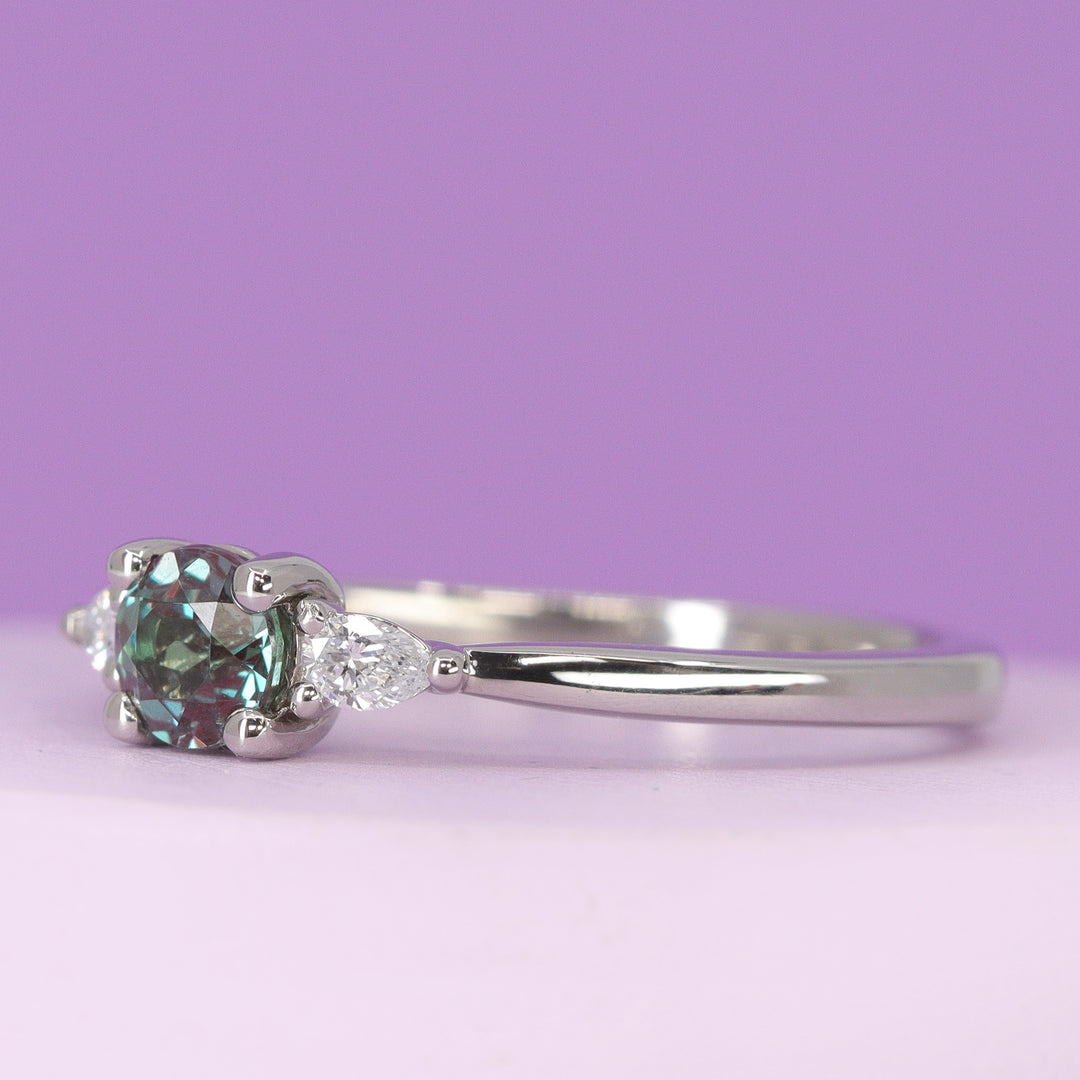 Elspeth - Round Brilliant Cut Lab Grown Alexandrite and Pear Shaped Lab Grown Diamond Trilogy Engagement Ring in Platinum - Ready-to-Wear