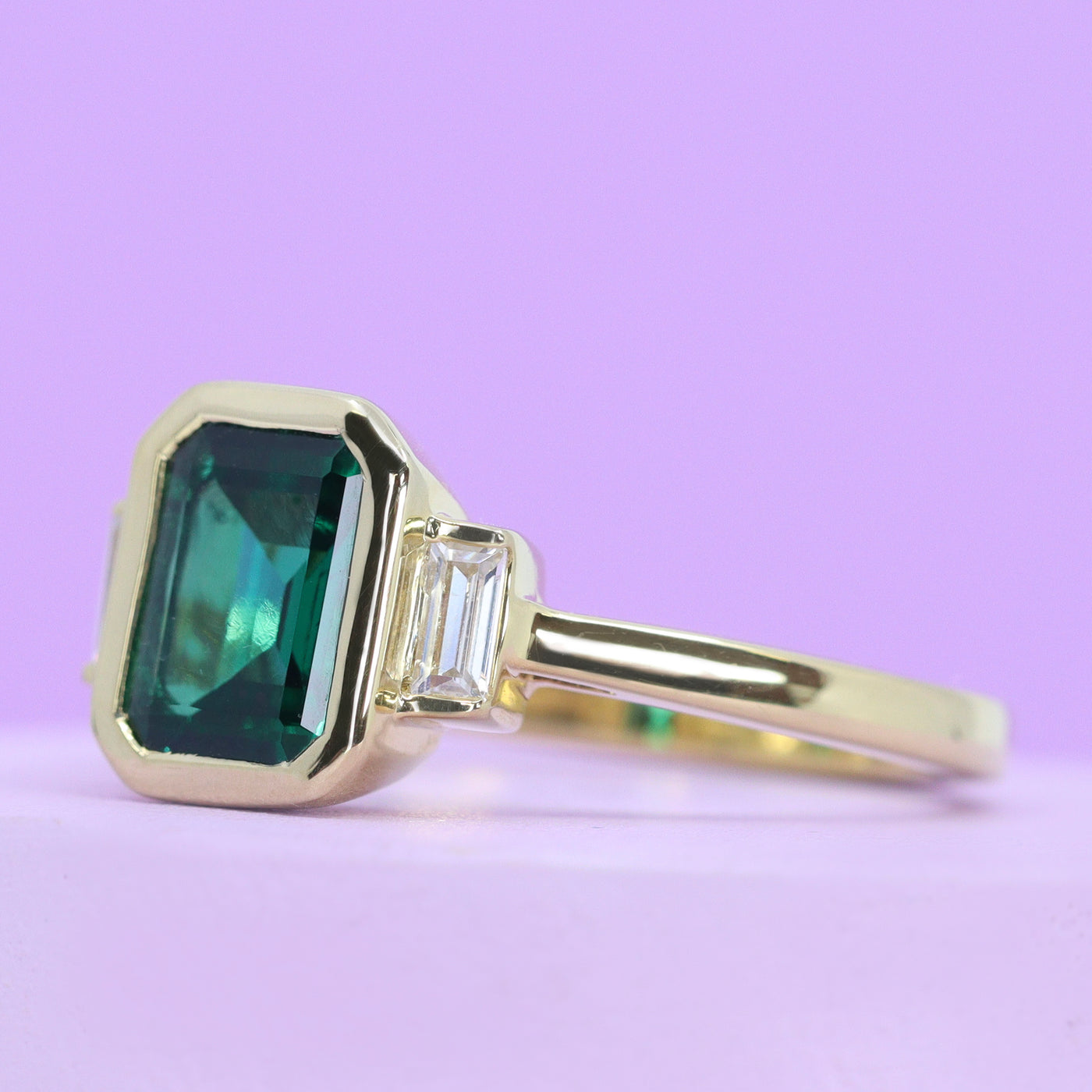 Phoebe - Octagon/Emerald Cut Earth or Lab Grown Emerald Bezel Set Modern Art Deco Engagement Ring with Baguette Diamonds - Custom Made-to-Order Design