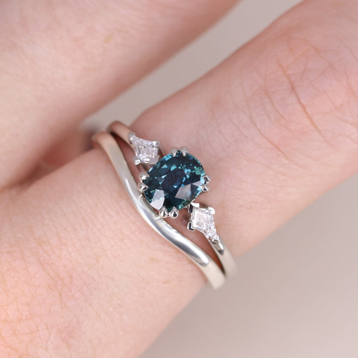 Unique engagement ring with teal sapphire and lab grown diamonds