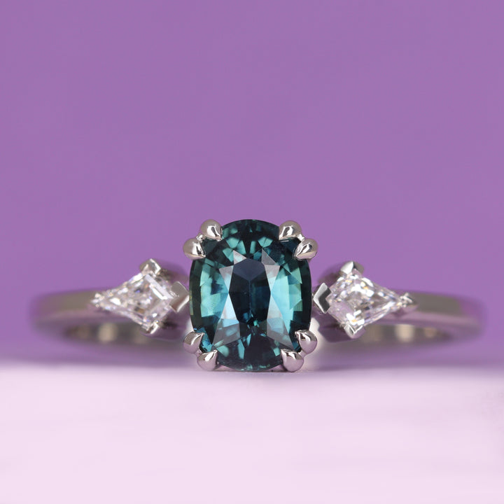 Dahlia - Oval Cut Teal Sapphire Trilogy Engagement Ring