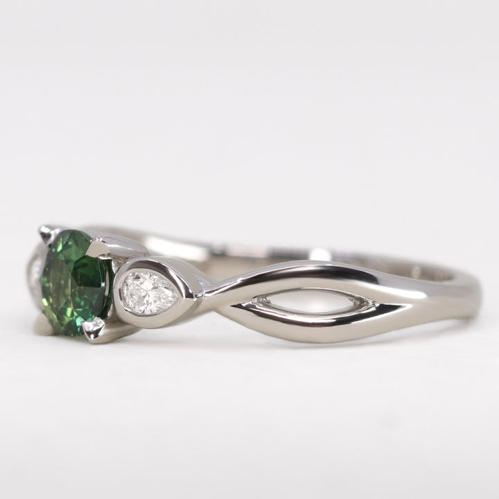 Evangeline - Round Brilliant Cut Teal Sapphire Trilogy Engagement Ring - Ready-to-Wear Engagement Rings - Ready-to-Ship