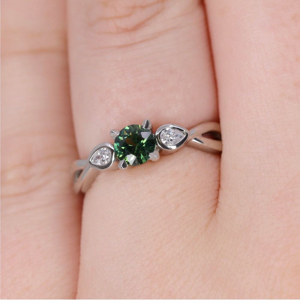 Evangeline - Round Brilliant Cut Teal Sapphire Trilogy Engagement Ring - Ready-to-Wear Engagement Rings - Ready-to-Ship