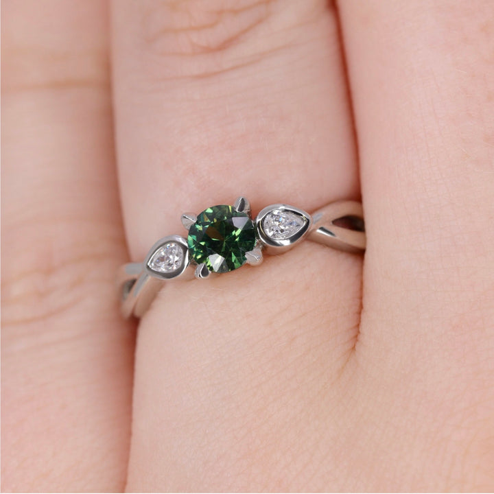 Evangeline - Round Brilliant Cut Teal Sapphire Trilogy Engagement Ring - Ready-to-Wear Engagement Rings - Ready-to-Ship