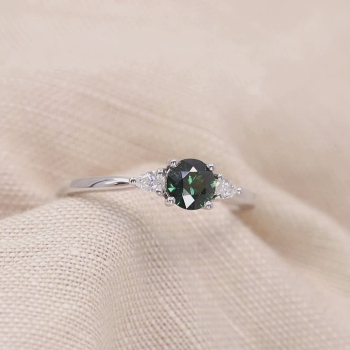 Elspeth - Round Cut Green Teal Sapphire Trilogy Engagement Ring - Ready-to-Wear Engagement Rings - Ready-to-Ship