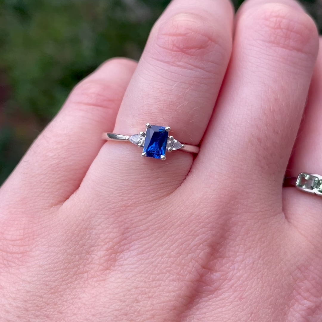 Elspeth - Radiant Cut Royal Blue Sapphire and Pear Shaped Lab Grown Diamond Trilogy Engagement Ring - Made-to-Order
