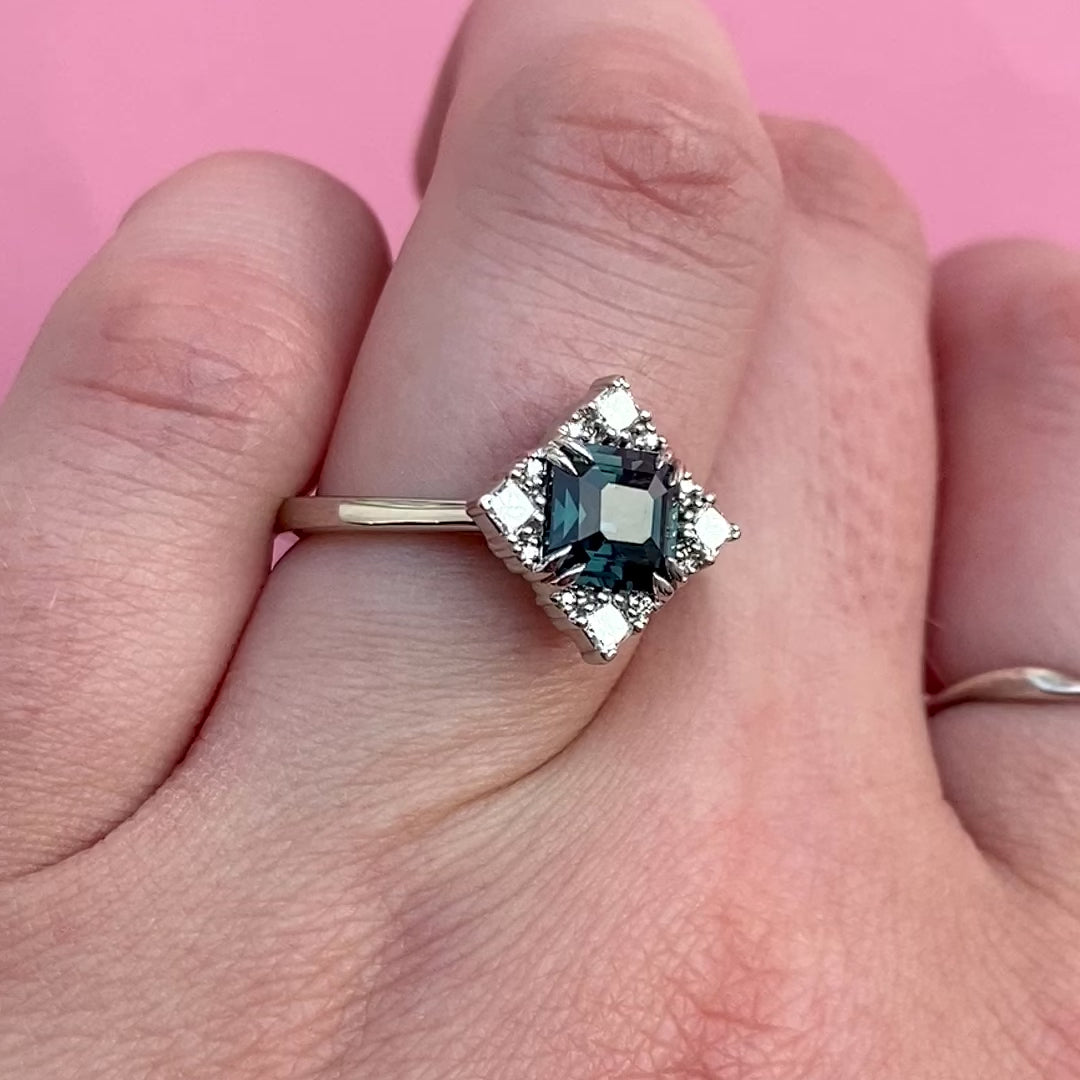 Scarlett - Dopamine by Jessica Flinn - Emerald Cut Teal Sapphire Engagement Ring with Diamond Halo in Platinum - Ready-to-Wear