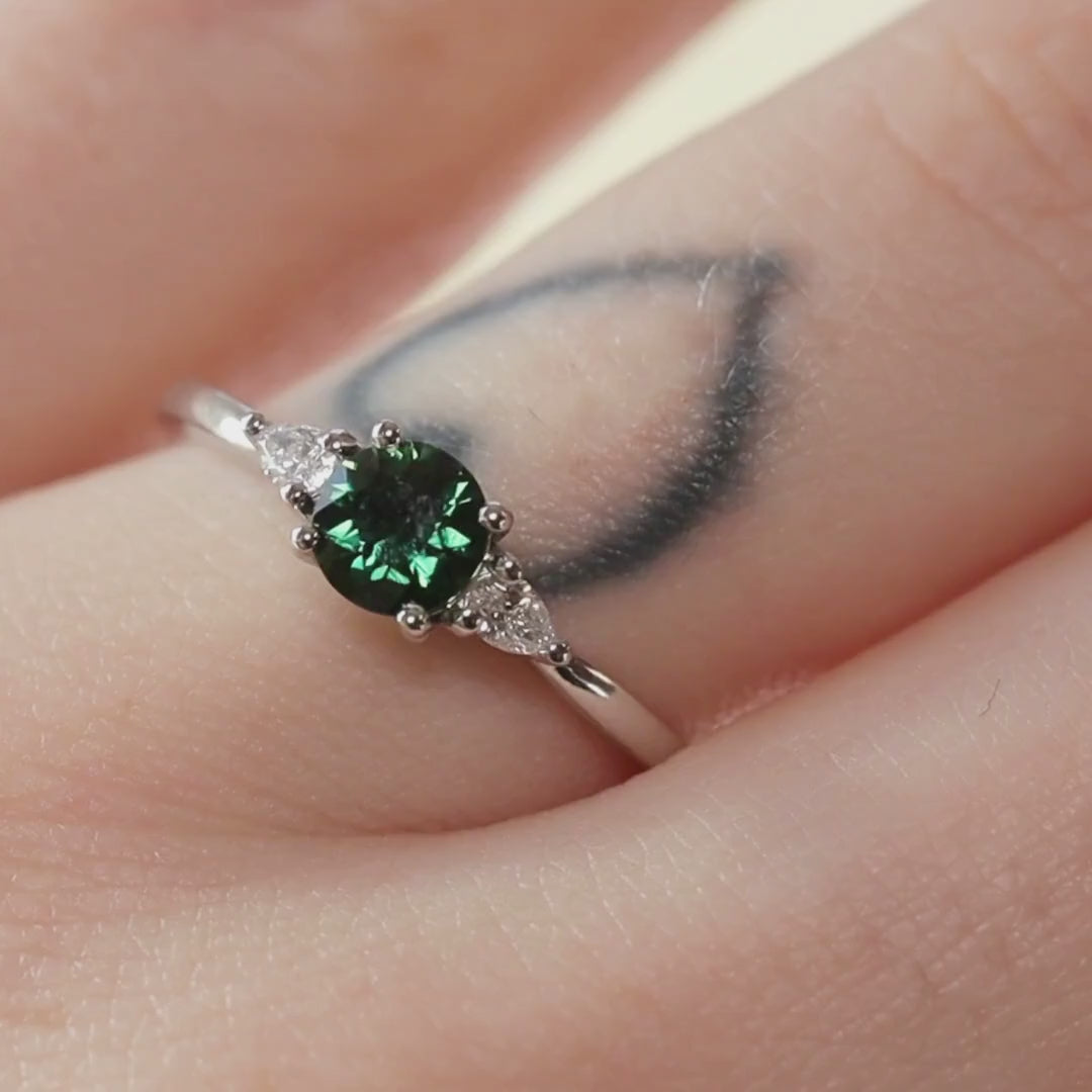 Elspeth - Round Cut Colour Change Teal Sapphire Trilogy Engagement Ring - Ready-to-Wear