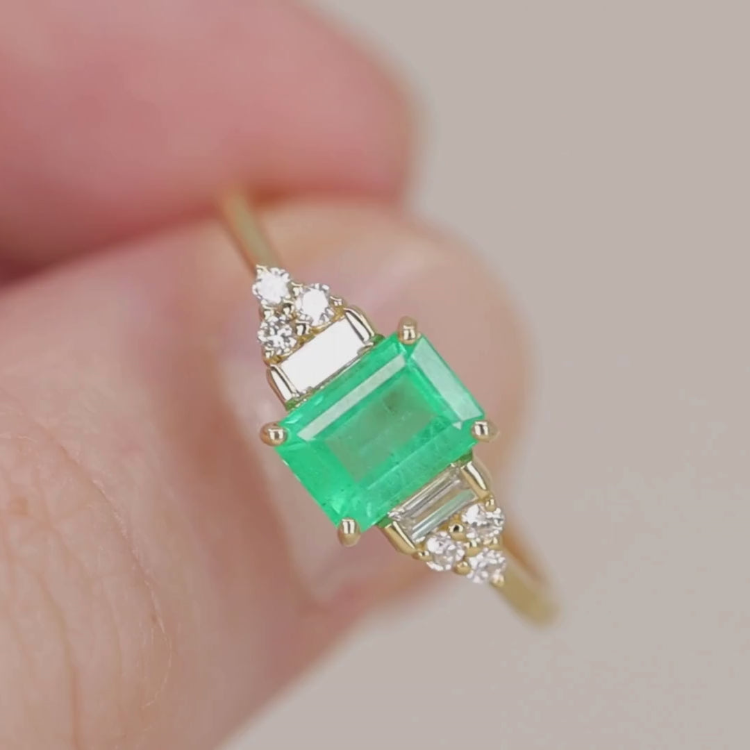 Art deco antique inspired gold engagement ring with emerald and diamonds