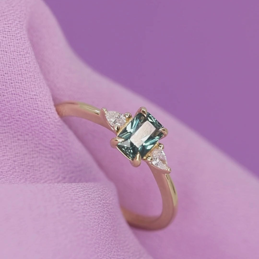 Elspeth - Radiant Cut Teal Sapphire and Diamond Trilogy Engagement Ring