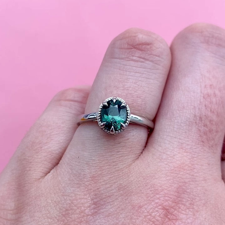 Georgia - Dopamine by Jessica Flinn - Oval Cut Teal Sapphire Solitaire Engagement Ring with Beading in Platinum - Ready-to-Wear