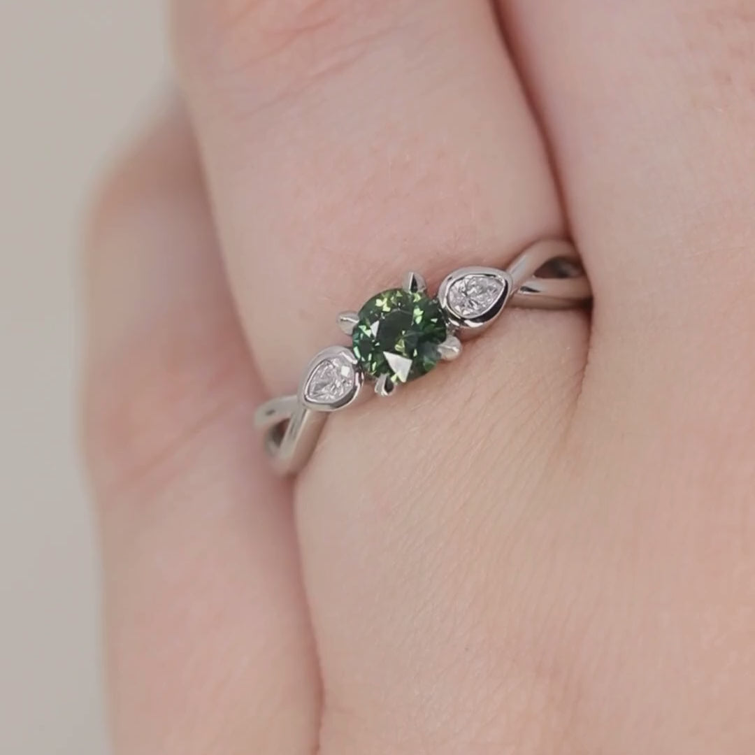 Evangeline - Round Brilliant Cut Teal Sapphire Trilogy Engagement Ring - Ready-to-Wear