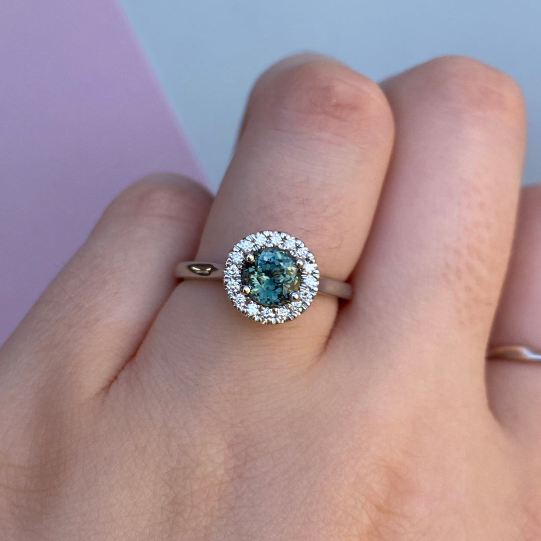 April - Round Teal Sapphire and Round Brilliant Cut Halo Engagement Ring - Made-to-Order
