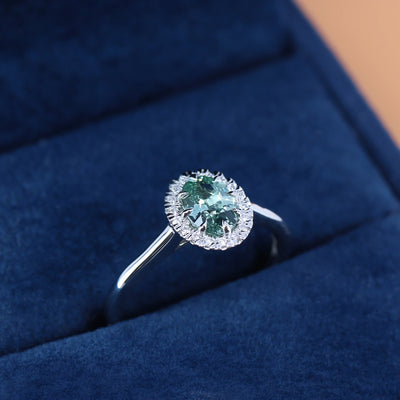 Charlotte - Oval Cut Pale Blue Green Sapphire Ring with Hugging Halo in Platinum - Custom Made-to-Order Design